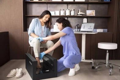 Scanning the feet of a patient using HP’s Arize Orthotic Solution, a new end-to-end digital orthotic solution developed for podiatrists and orthotists. 